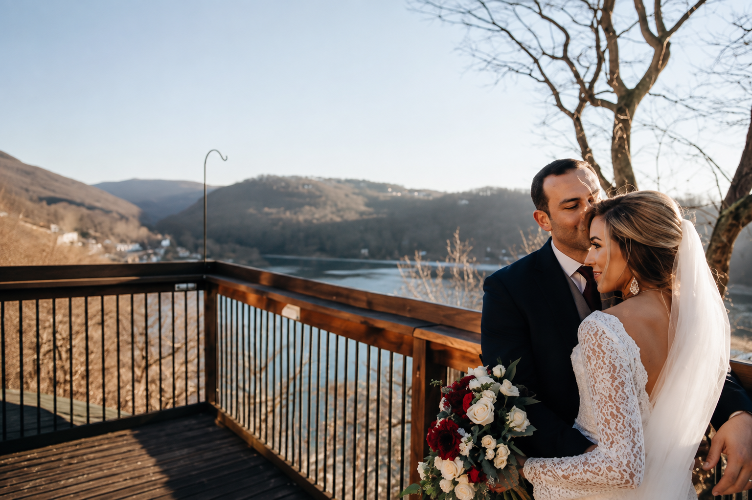 Bride and groom celebrating at Lakeview Golf Resort overlooking Cheat Lake